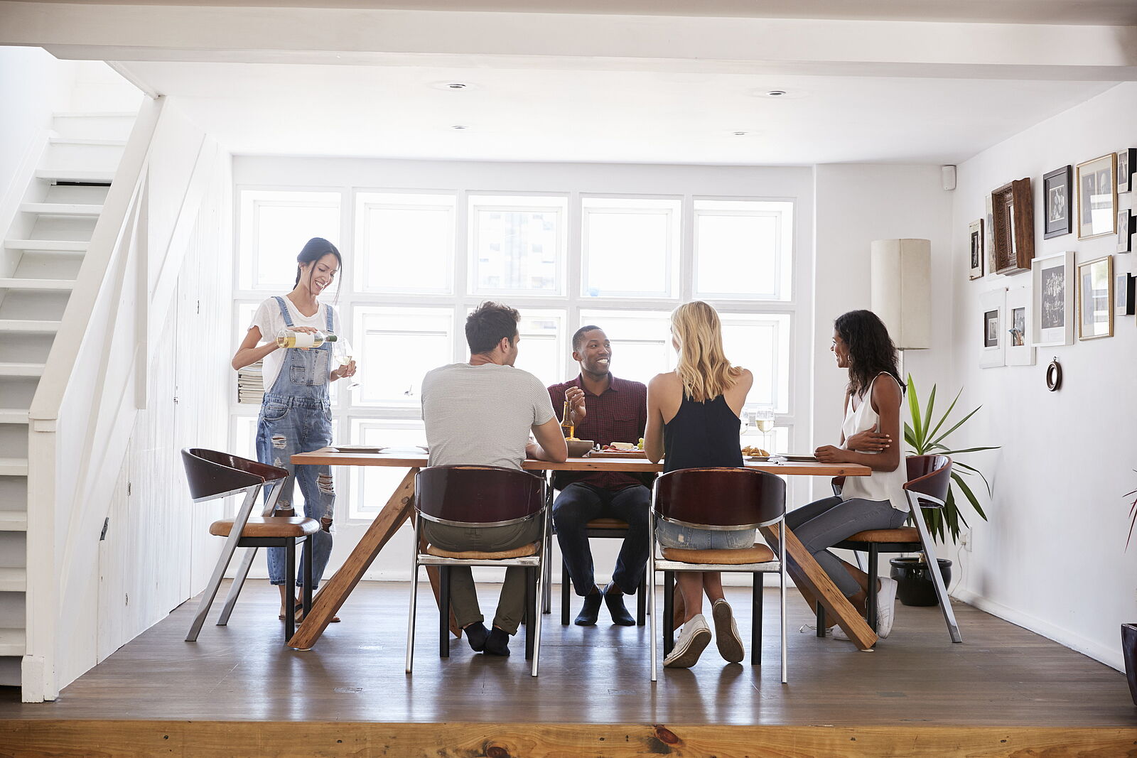 friends around table at dinner party